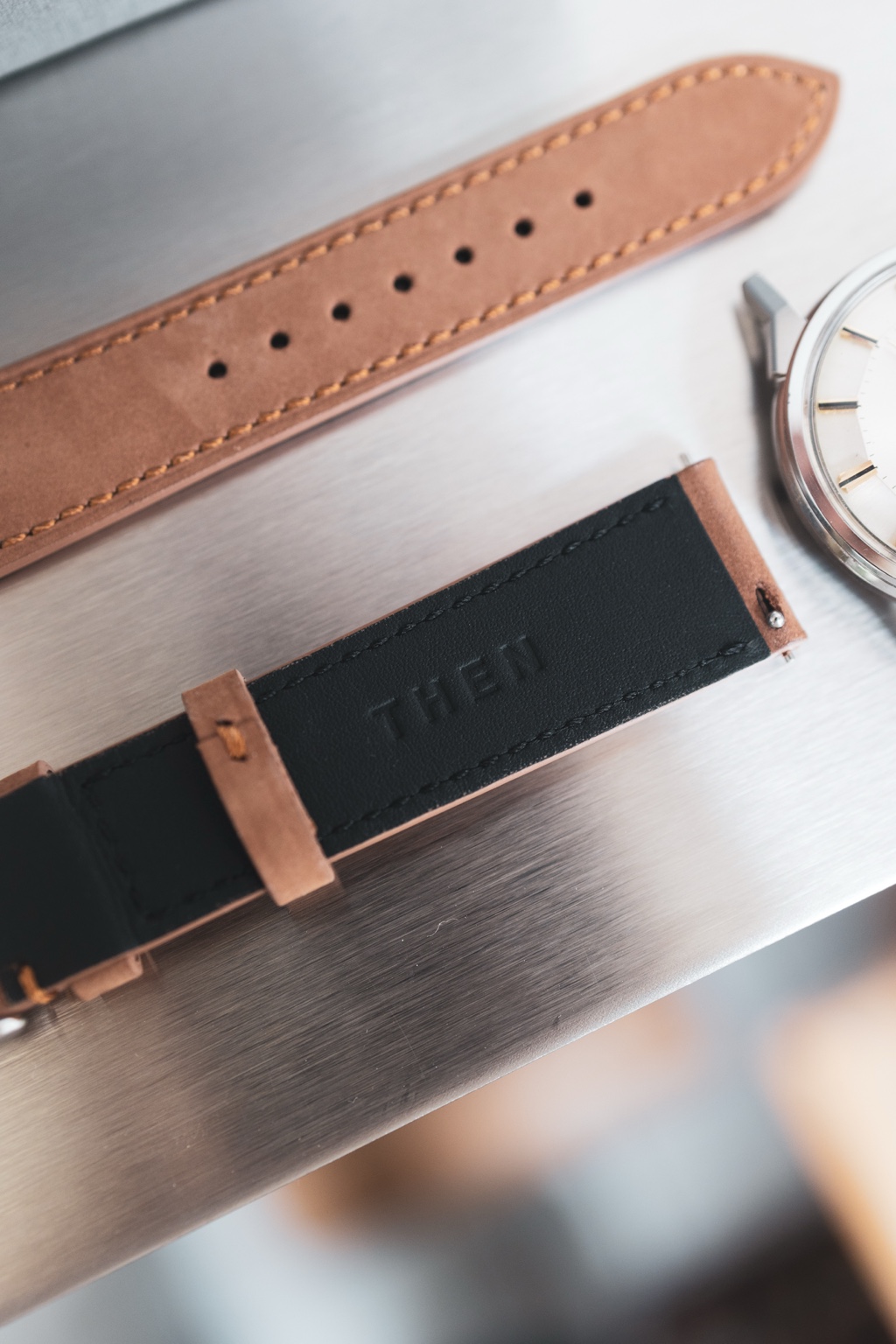 A THEN leather watch strap in the showroom